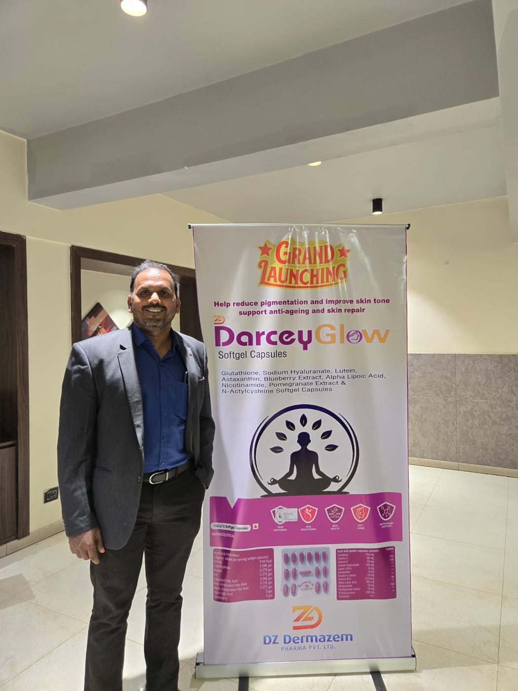 A Grand Launching standee for DarceyGlow at an IBG Wellness product launch